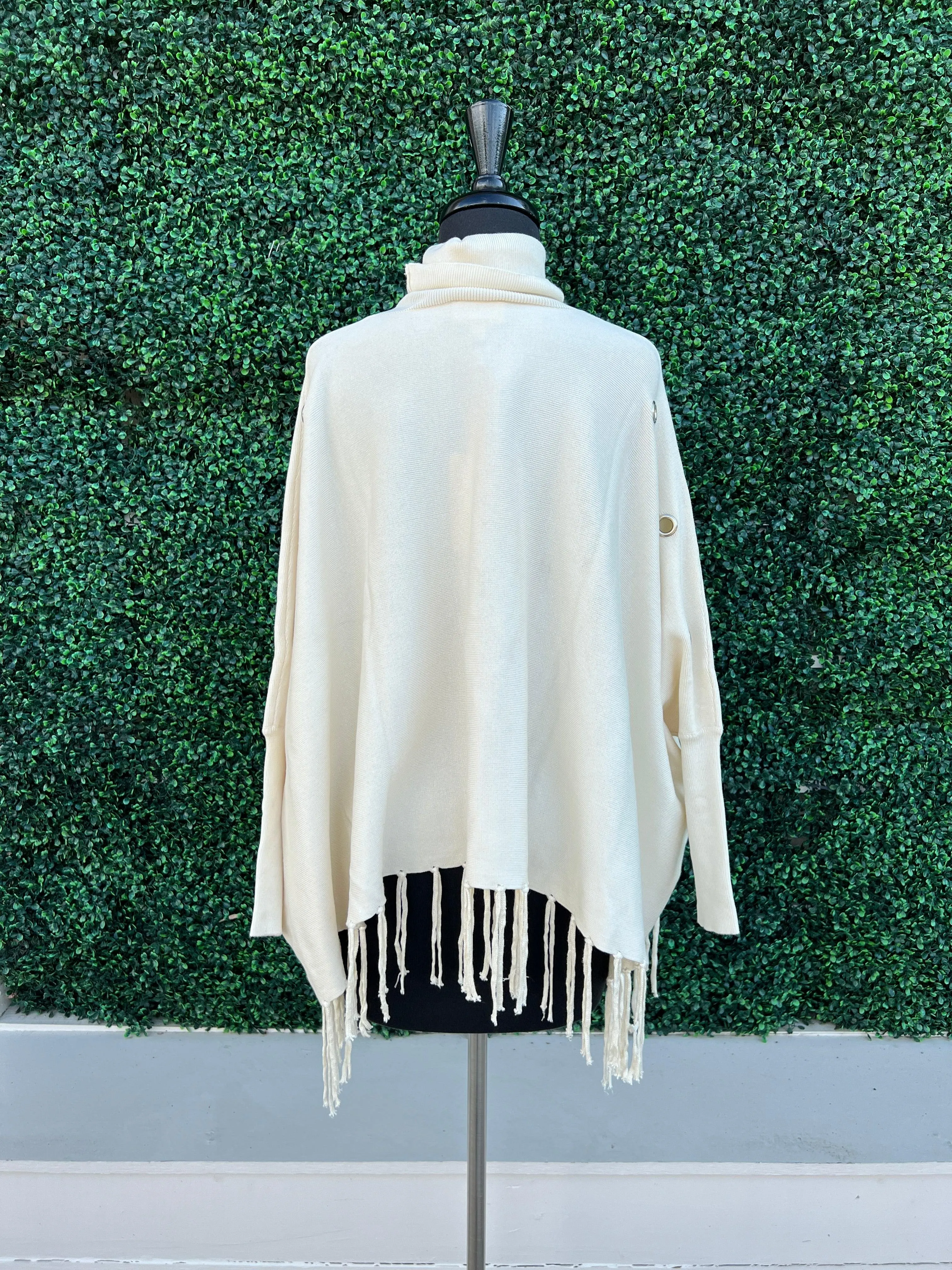 Turtleneck Poncho with Grommets